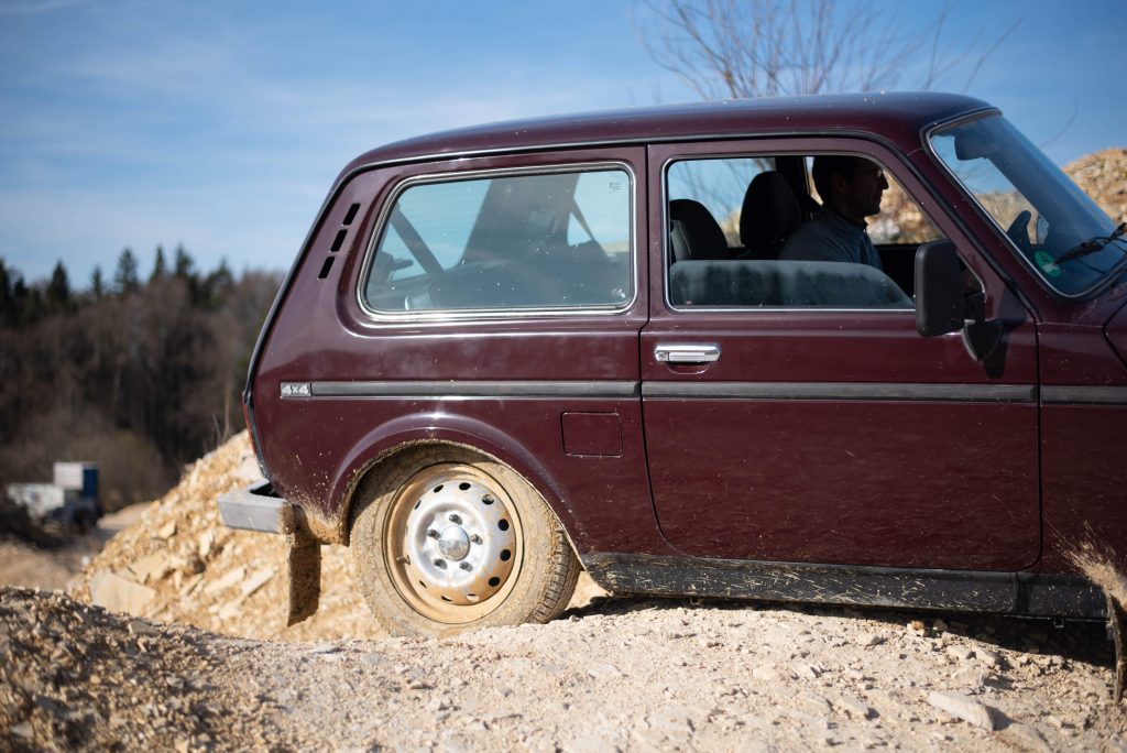 lada niva 4x4 quarry off road rear half tire dirty