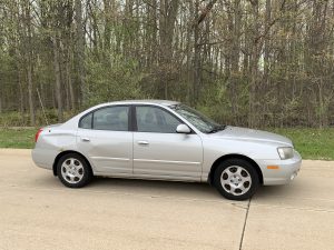 2003 Hyundai Elantra BadCar Driver side profile dents
