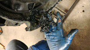 gloves covered in oil gloves covered in oil