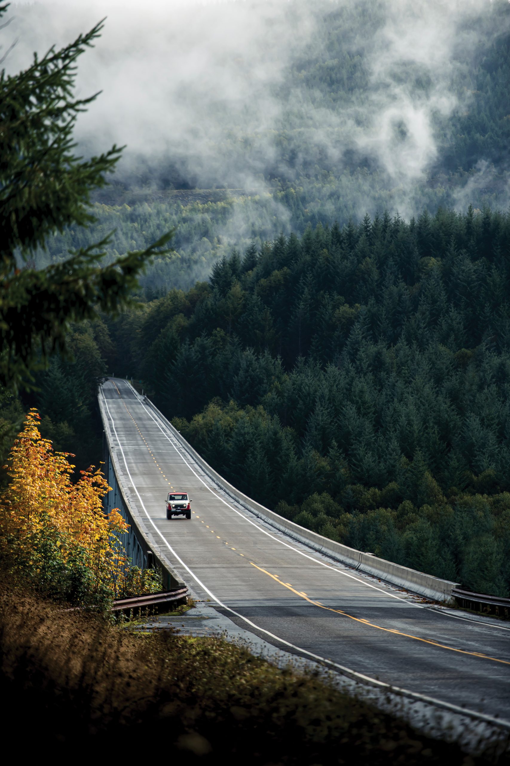 FJ55 Land Cruiser Crossing Distant Bridge