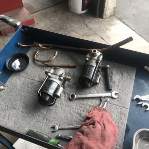 car lines pumps and tools on cart