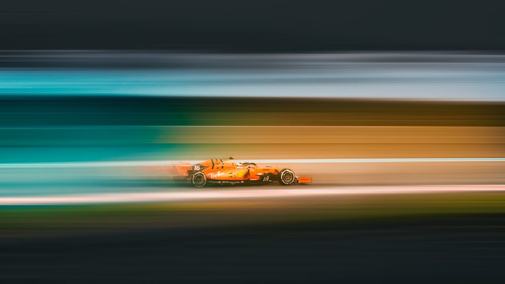 formula 1 car blue action side profile