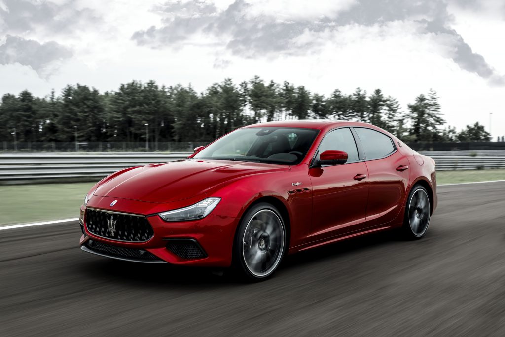 red ghibli front three-quarter track action