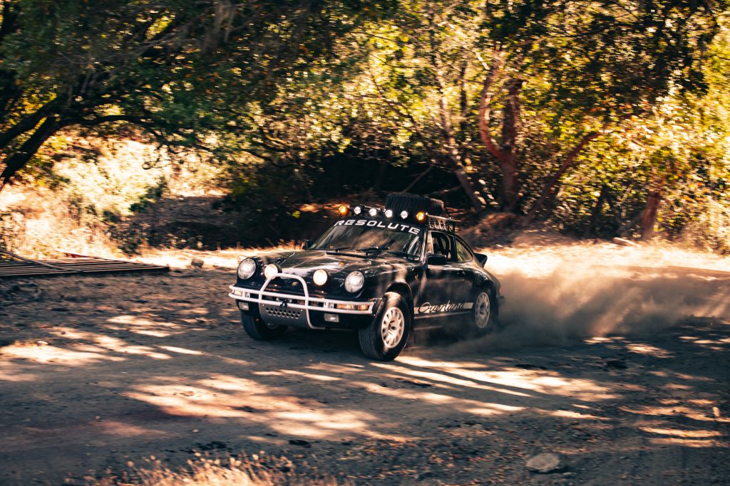 911 Porsche Resolute Overland on trail front three-quarter dynamic action