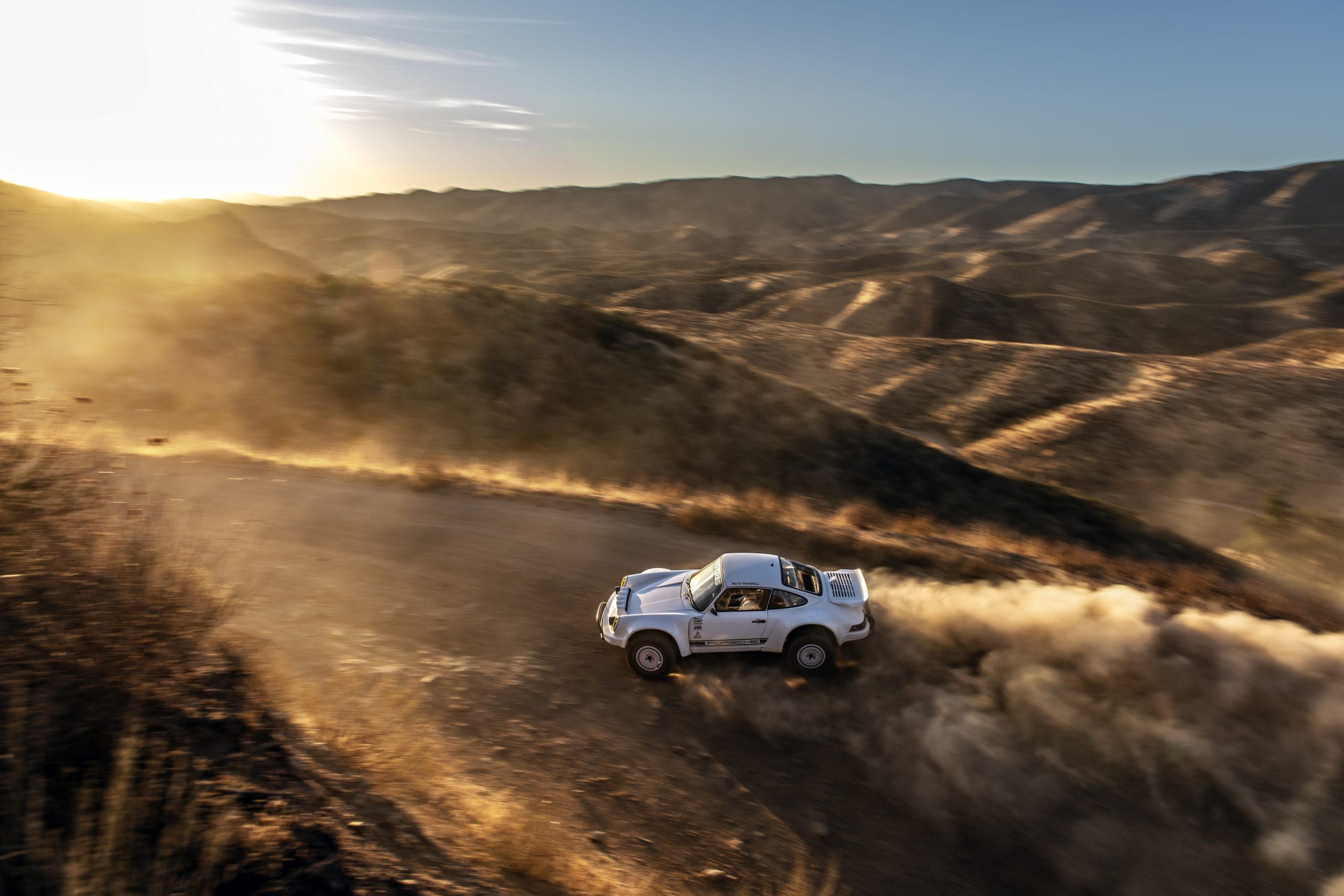 911 Safari story TJ Russell 911 Baja overhead dynamic dirt road action