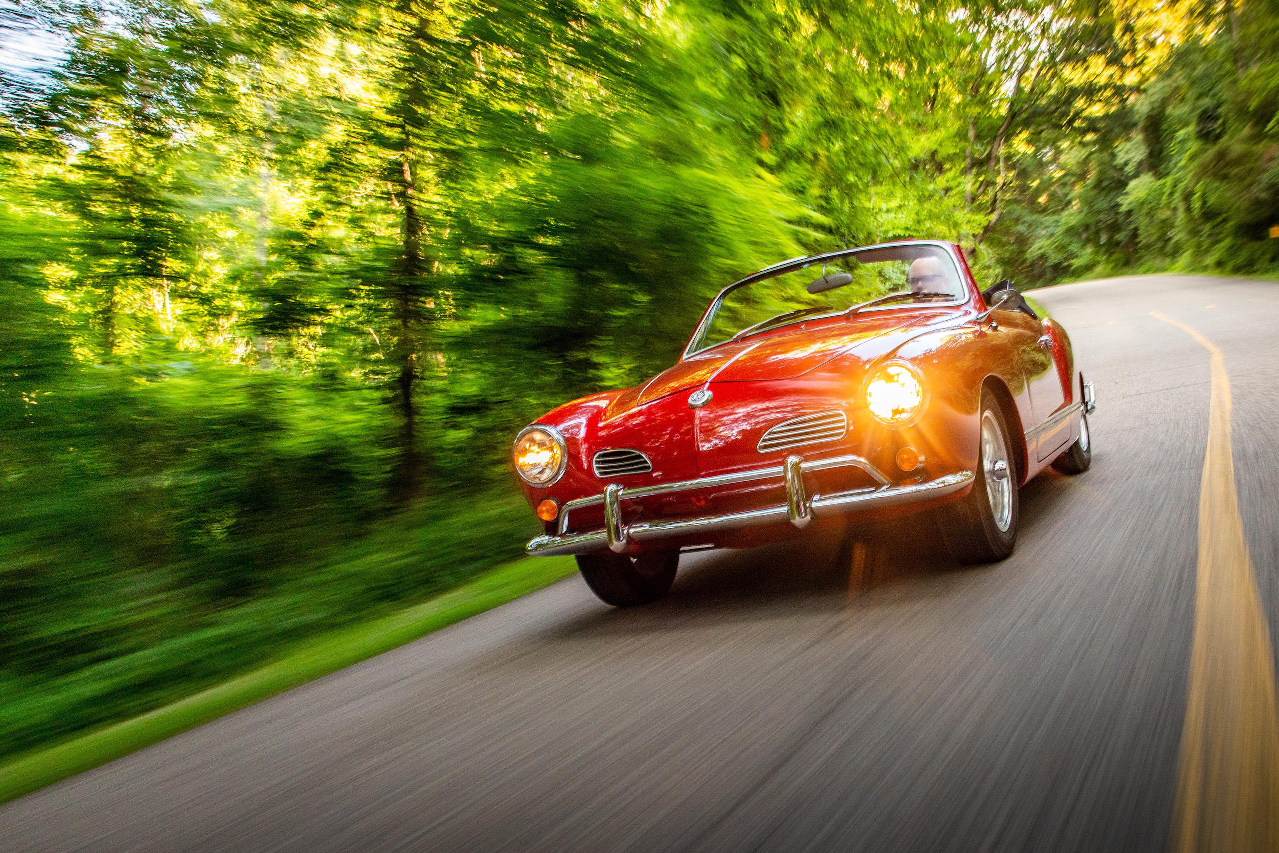volkswagen karmann ghia front three-quarter driving action