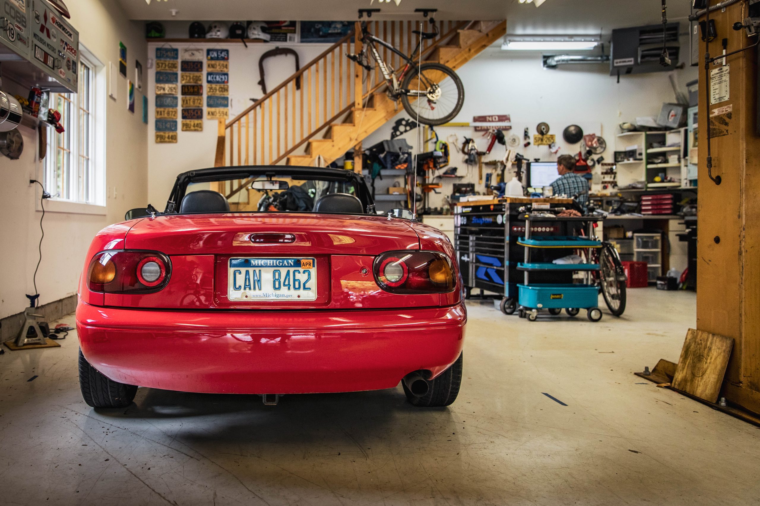 first gen red mazda miata rear