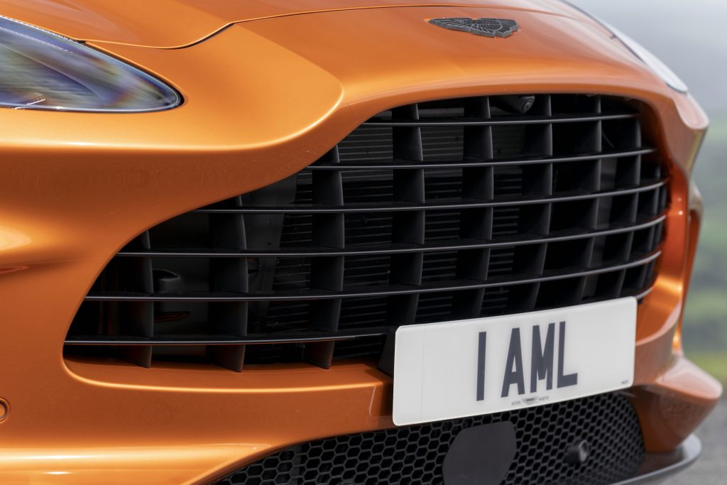 aston martin new dbx suv golden saffron grille