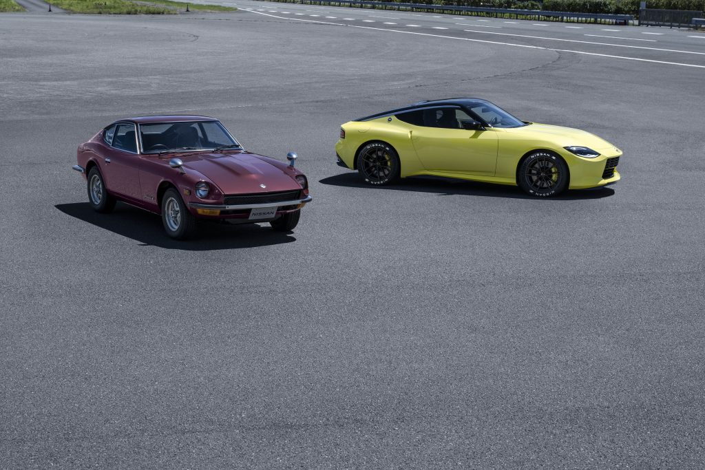 nissan new z car prototype beside datsun 240z