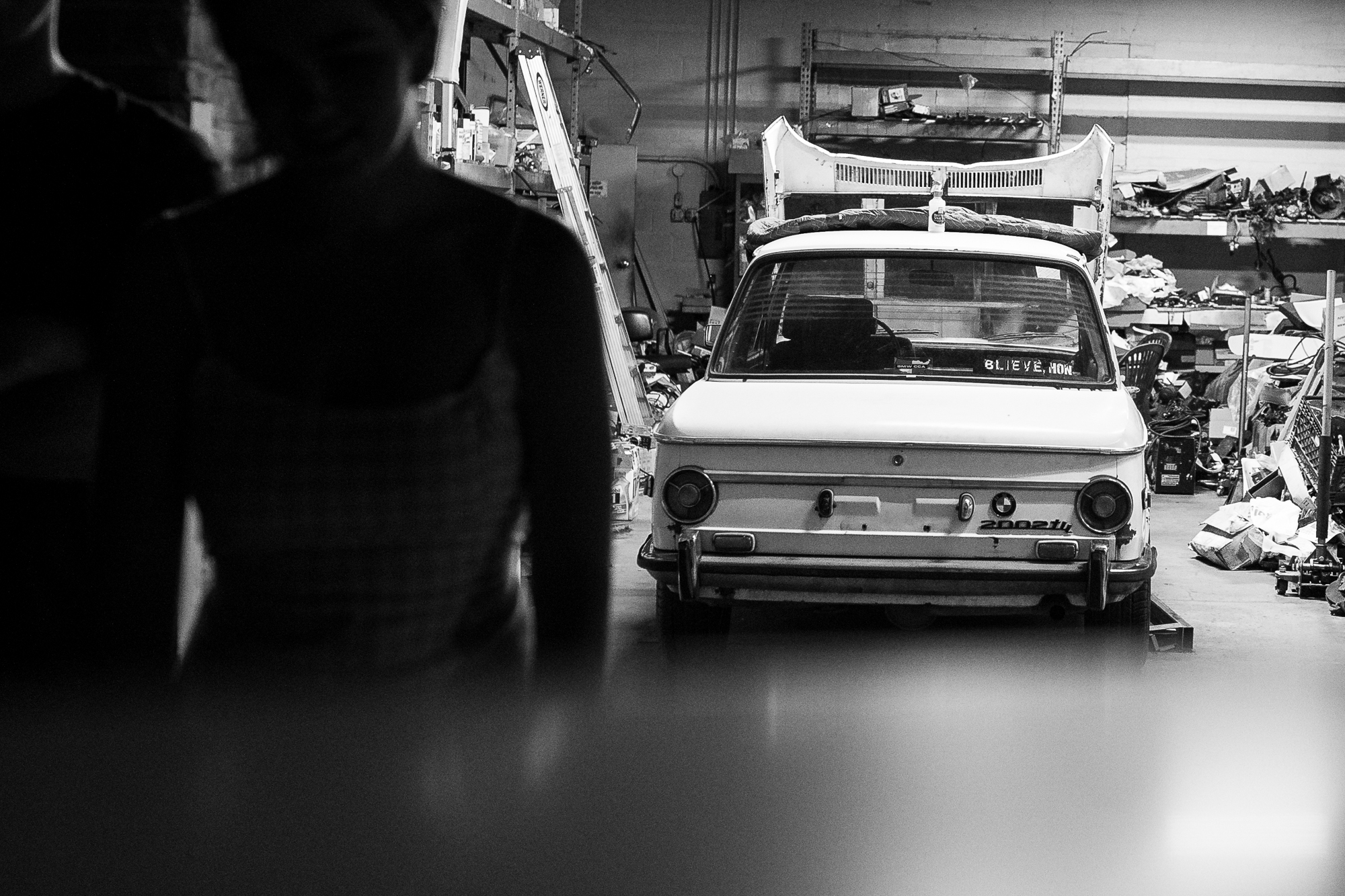 bmw 2002 restoration project rear end in garage
