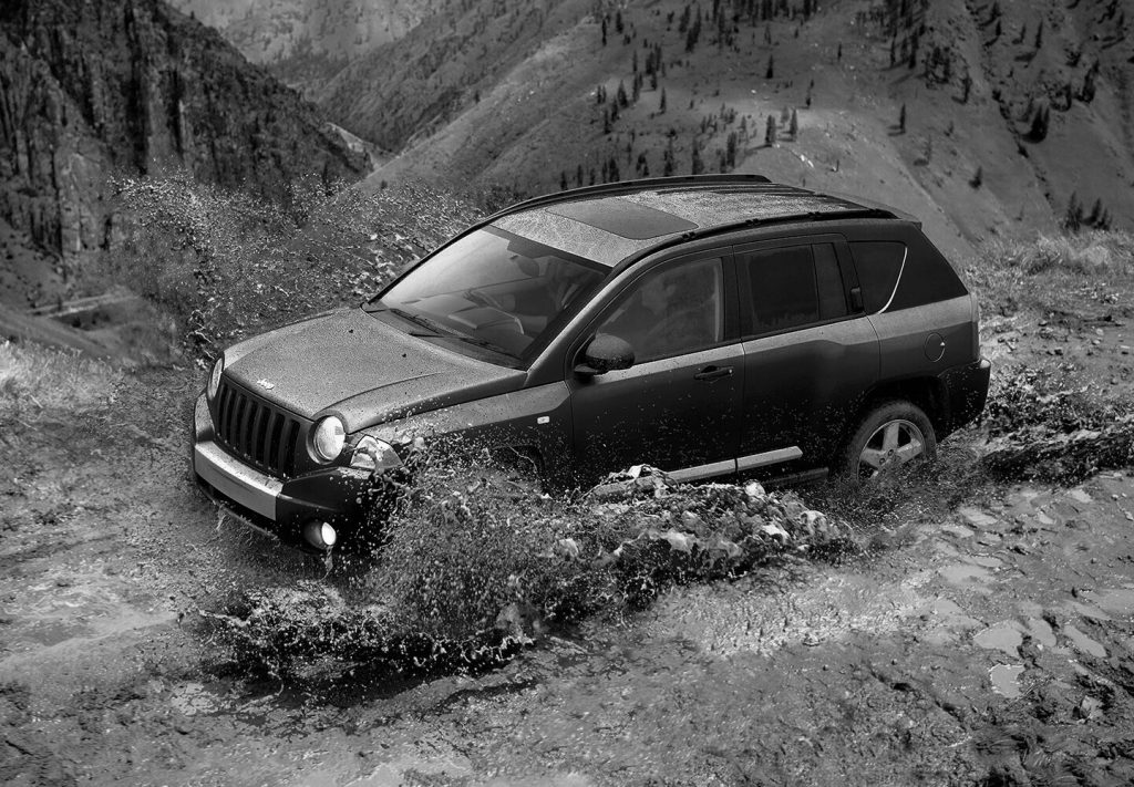 first gen jeep compass off roading mud action