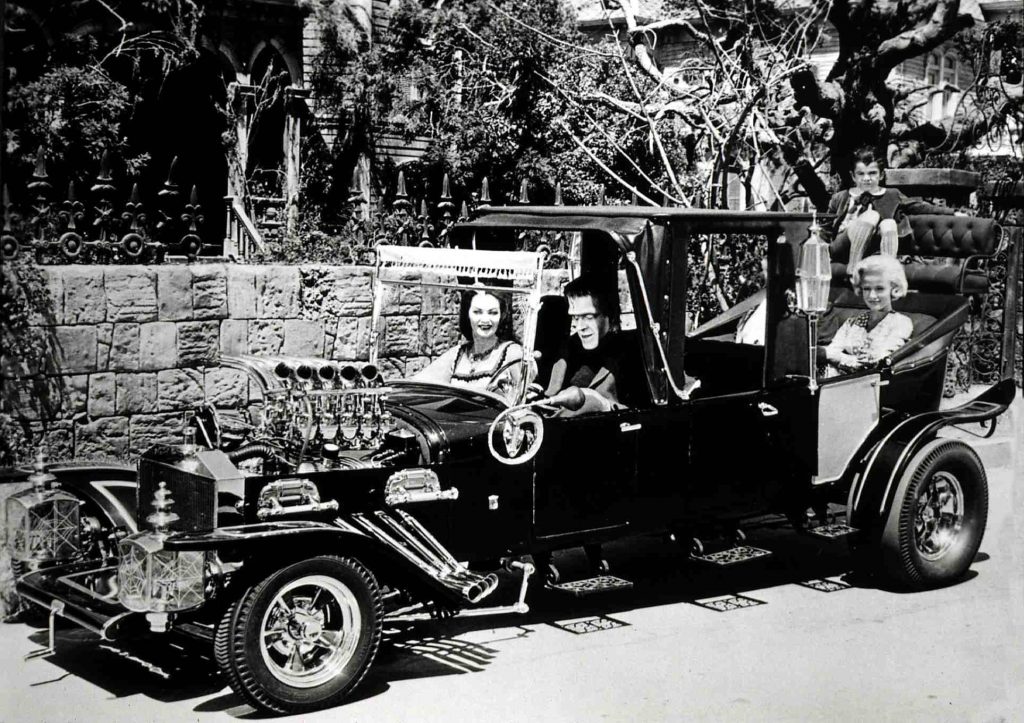 Munsters Cast in Koach custom roadster hot rod by george barris