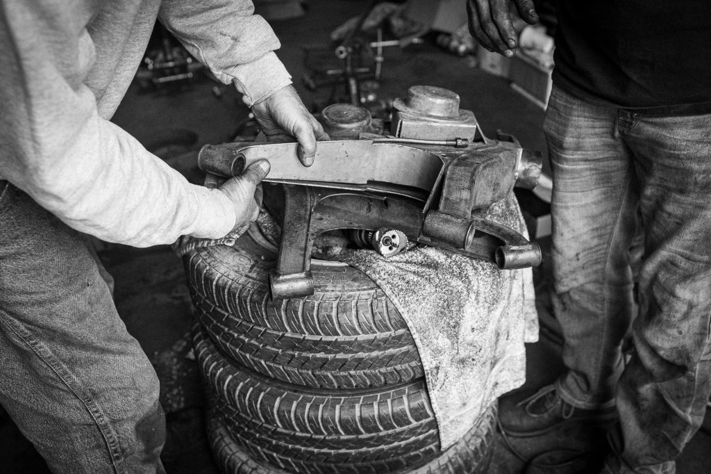bmw 2002 resto trailing arms on tire stack