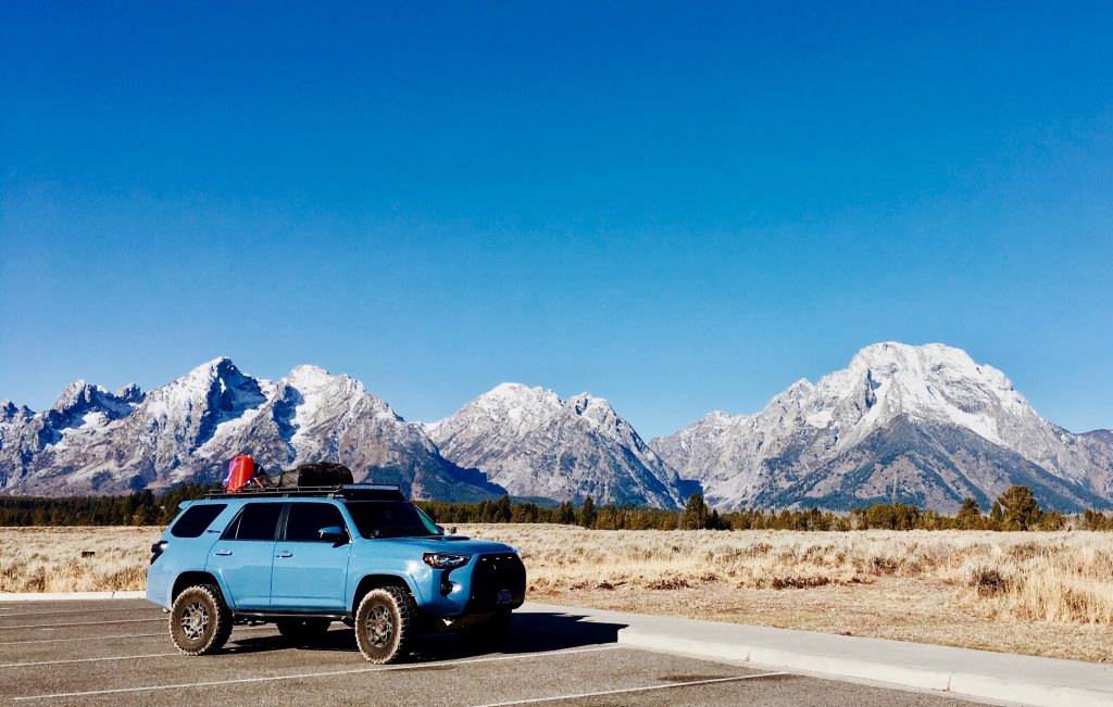 4runner jerrycan on roof cargo rack and mountain range