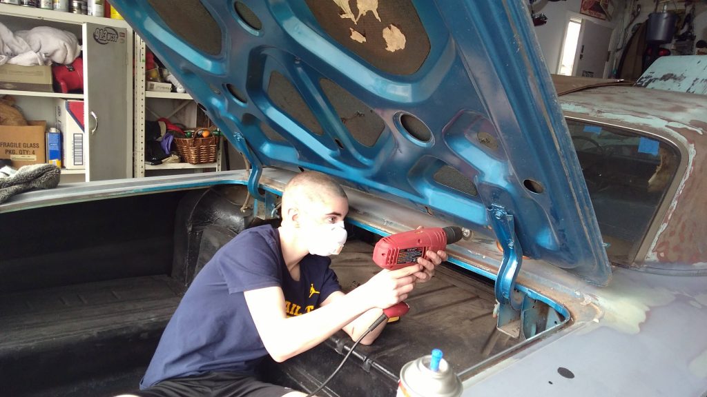 Jason Prince - 1962 Chevrolet Impala - Before resto - Noah working on trunk