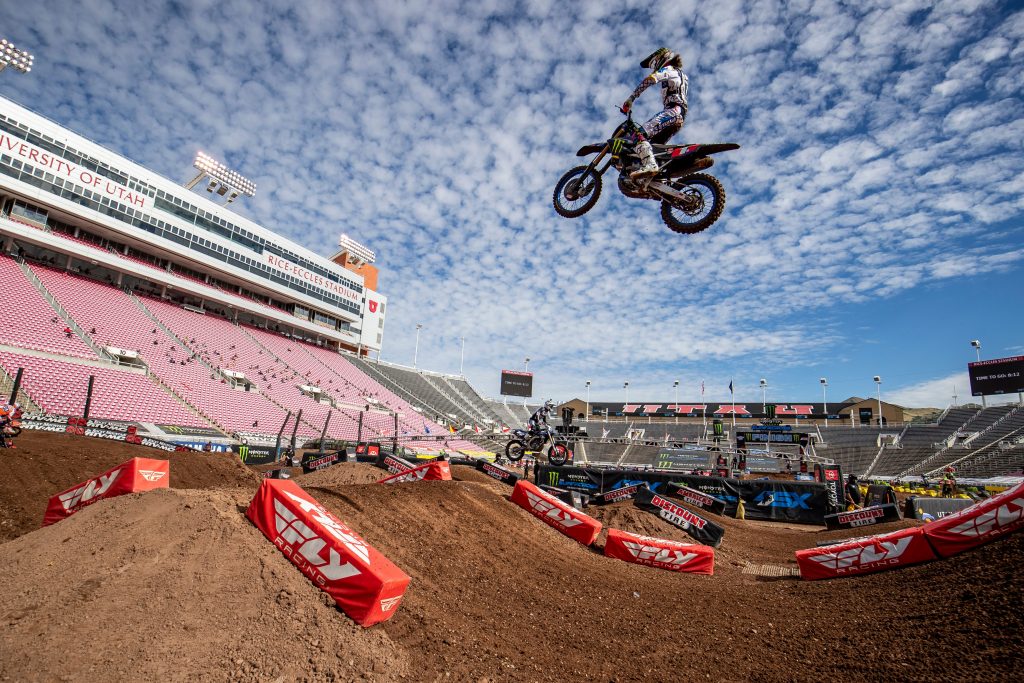 Supercross bike rider airborne over gap action