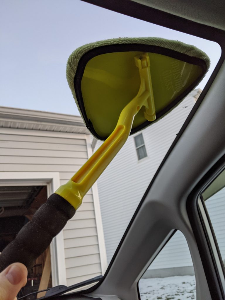 Windshield cleaning with microfiber cloth Windshield cleaning with microfiber cloth