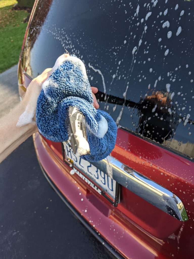 Cleaning car exterior windows Cleaning car exterior windows
