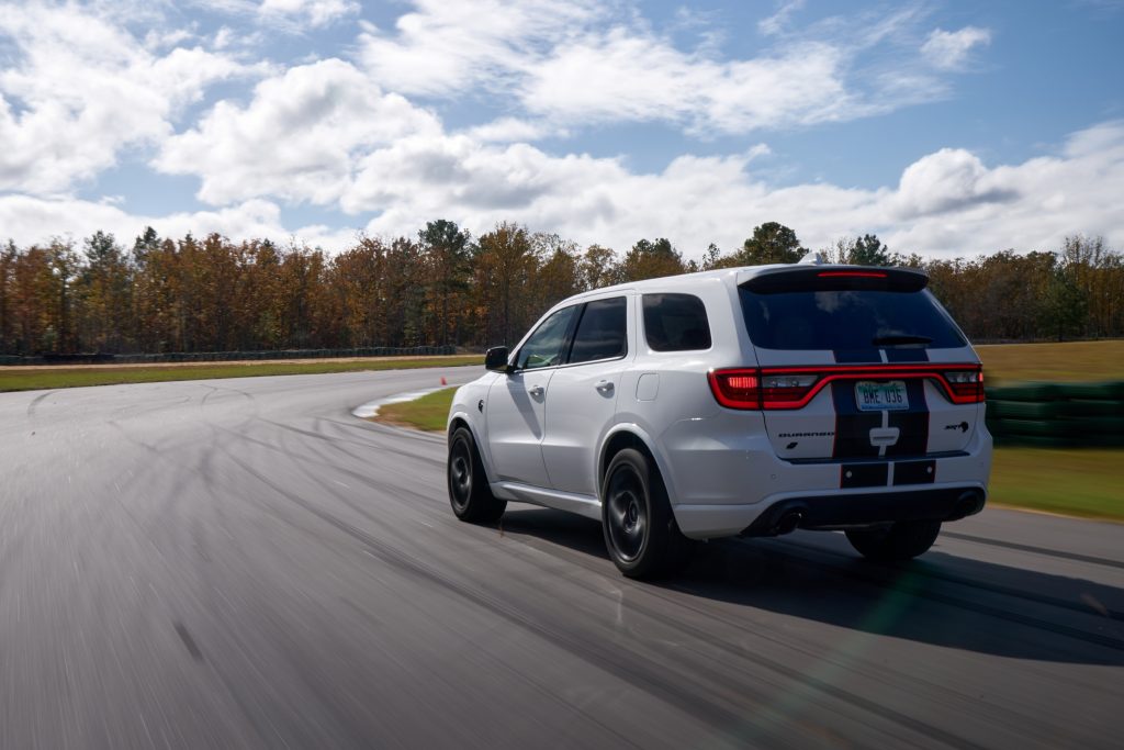 2021 Dodge Durango SRT Hellcat white rear three quarter driving