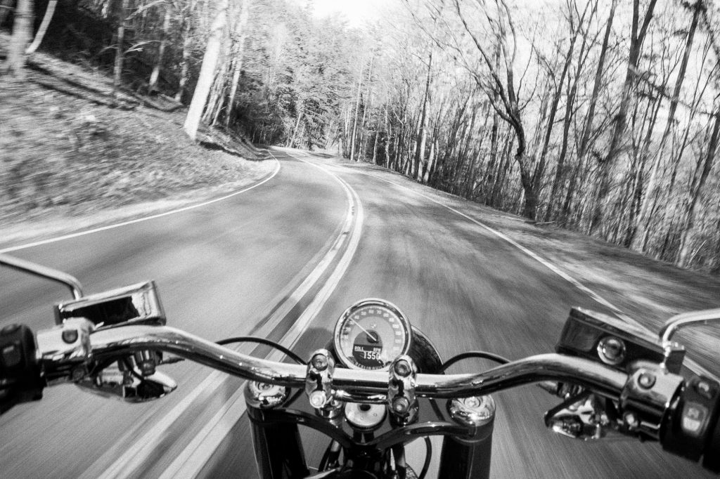 BMW R 18 motorcycle handlebar riding action black white