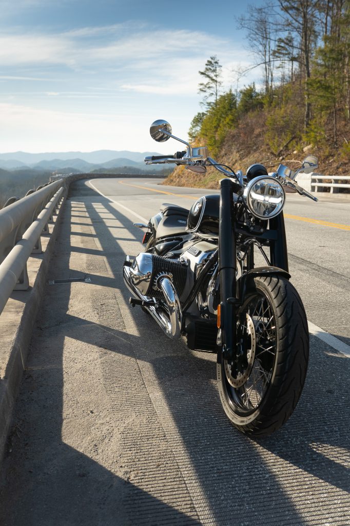 BMW R 18 motorcycle parked roadside front three-quarter