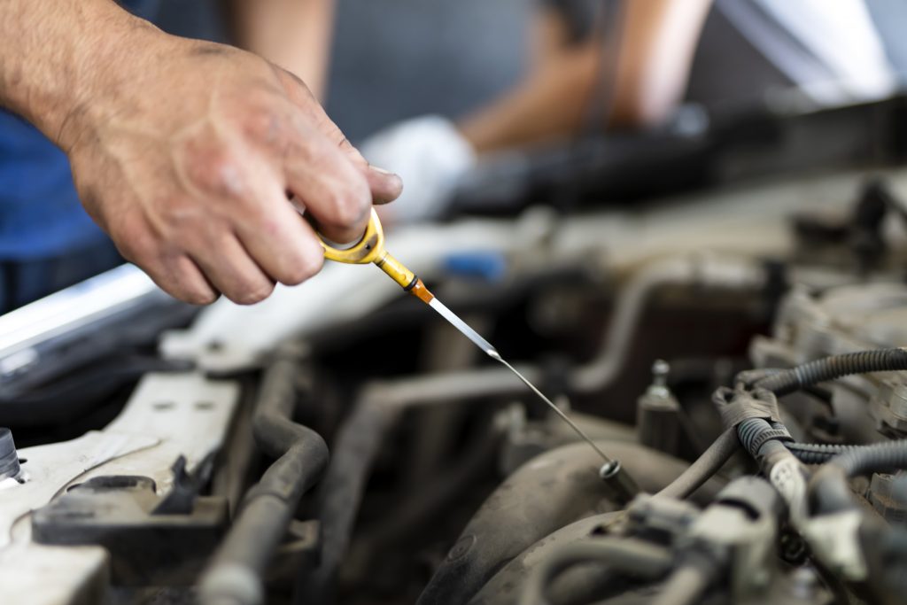 Car Engine dipstick pull detail close