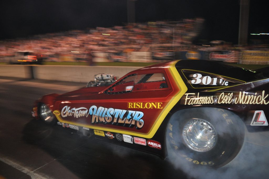 IHRA drag car take off action rear tire smoke