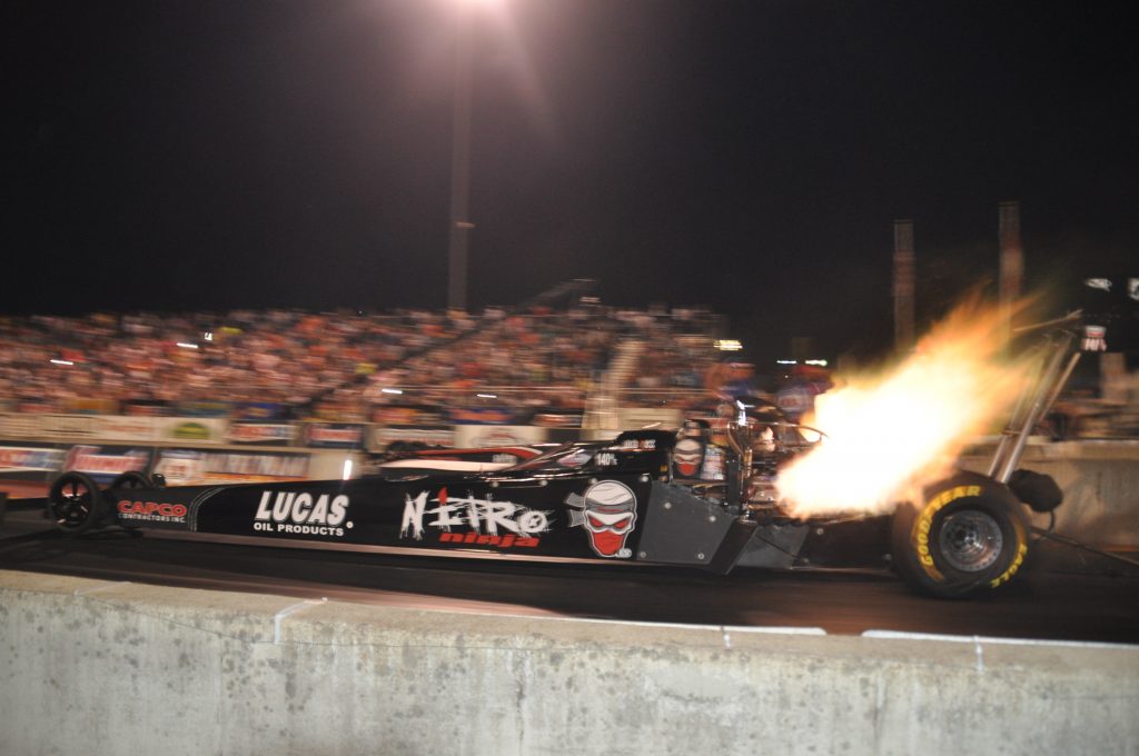 IHRA drag car take off action flame