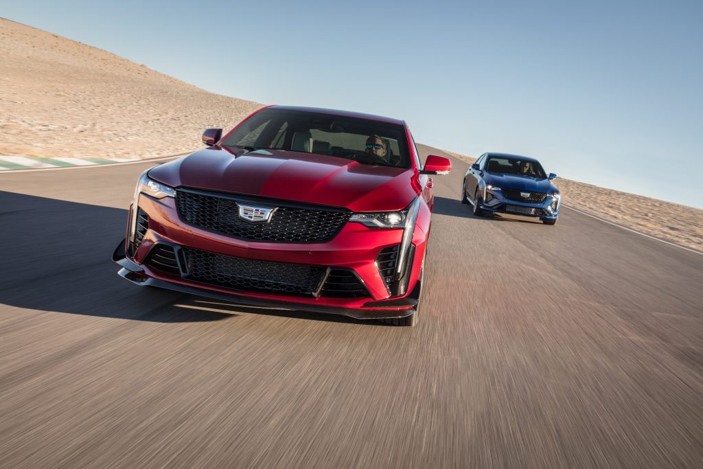 2022 Cadillac CT4-V Blackwing two cars front end driving