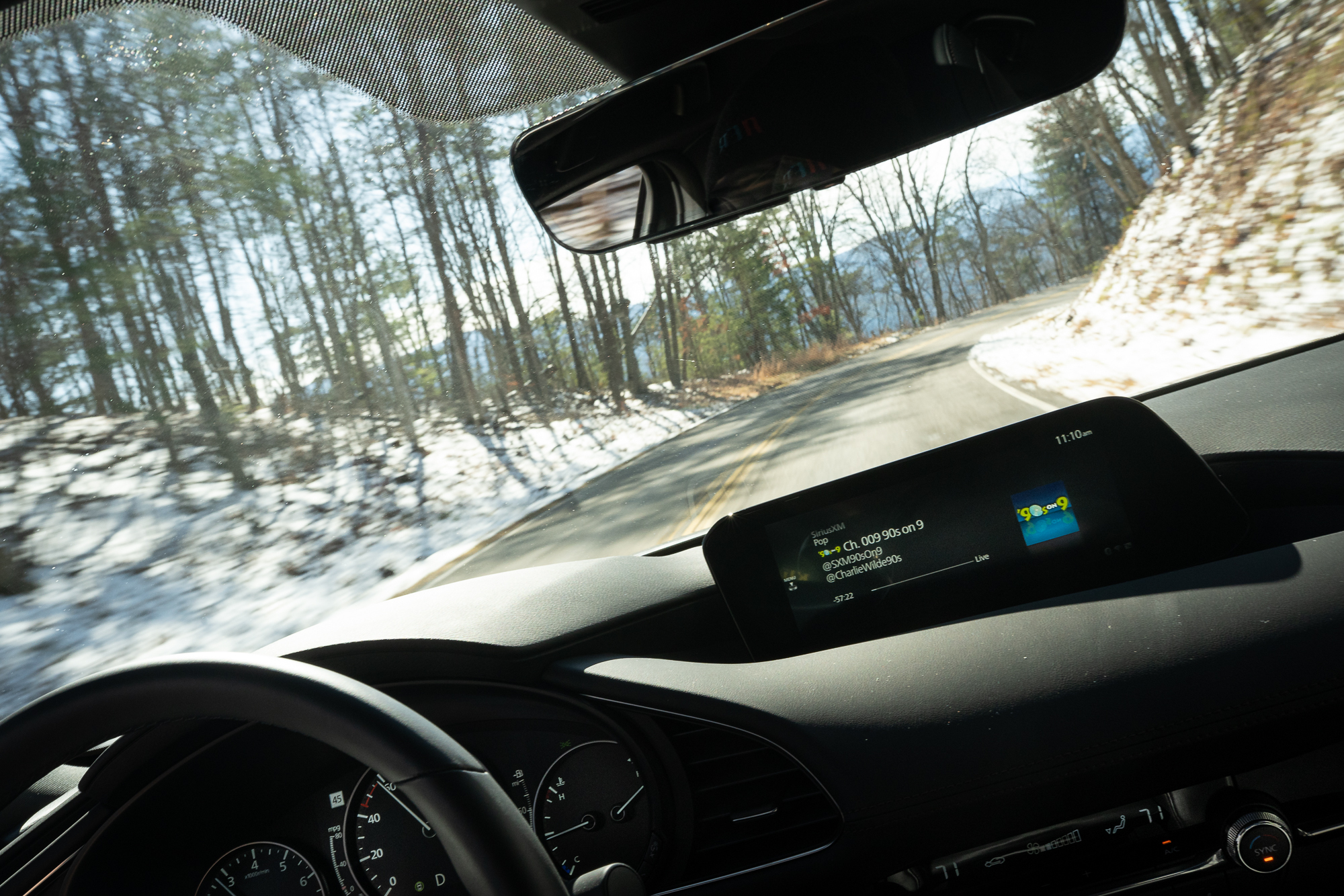 2021 Mazda 3 2.5T AWD interior front driving action