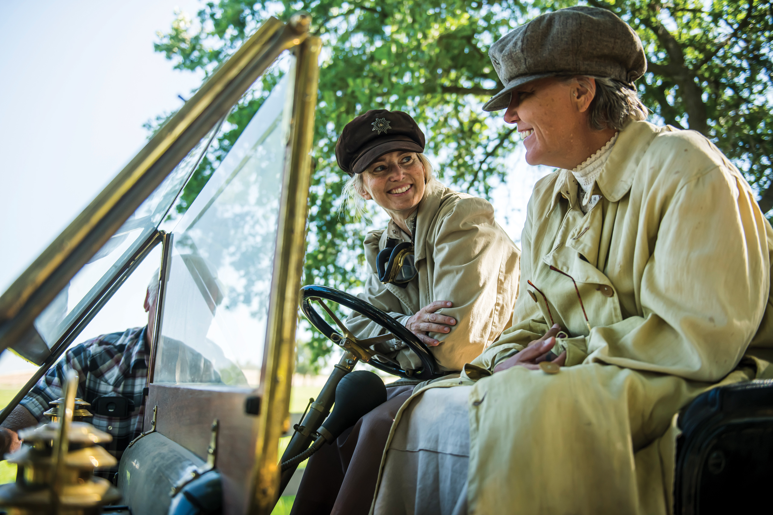 lyn woodward and emme hall smiling in costume