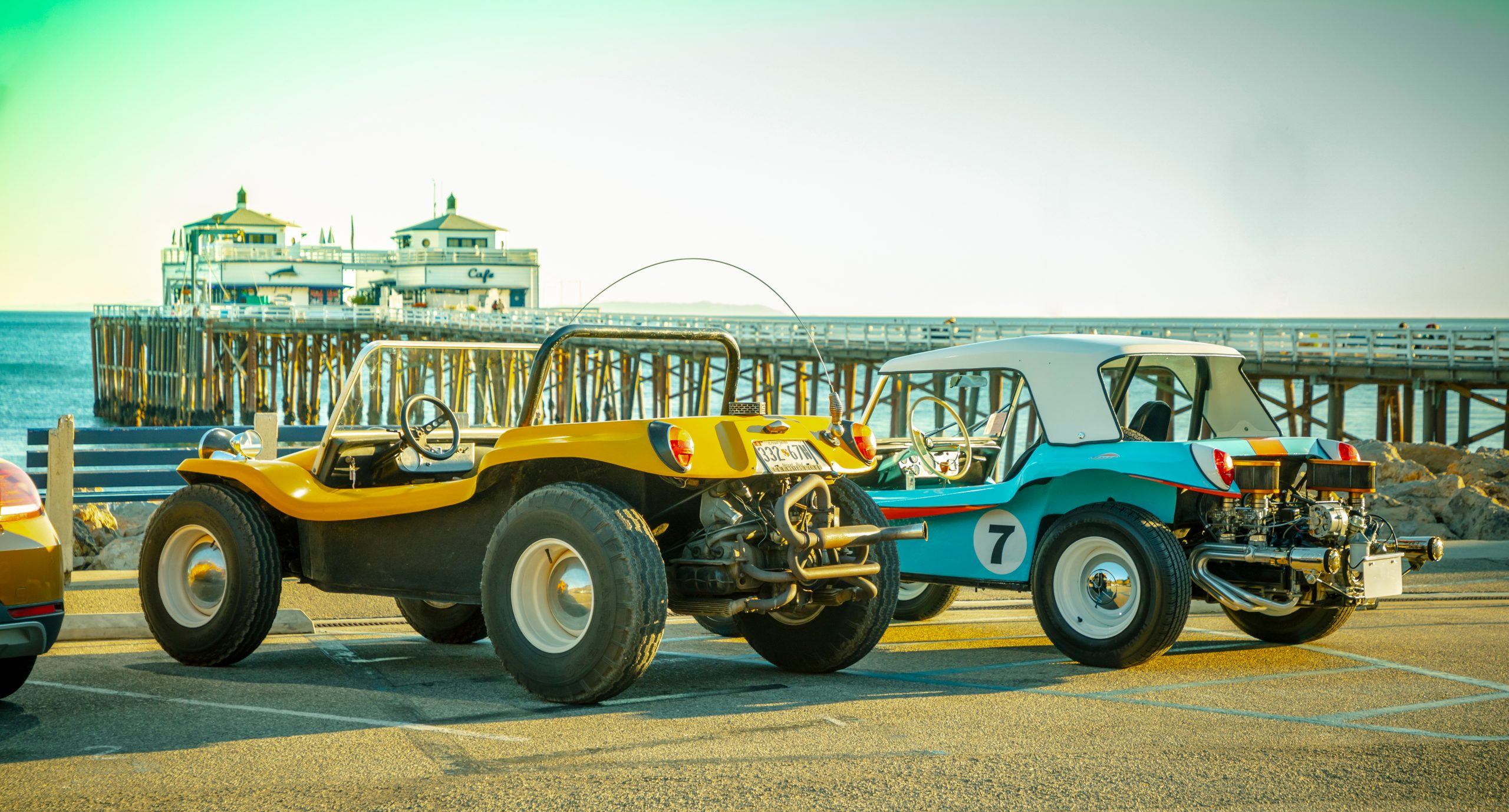 Meyers Manx Dune Buggies parked at beach rear three-quarter