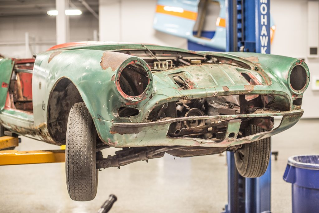 Sunbeam Tiger Hagerty Employee Restoration project car front on lift