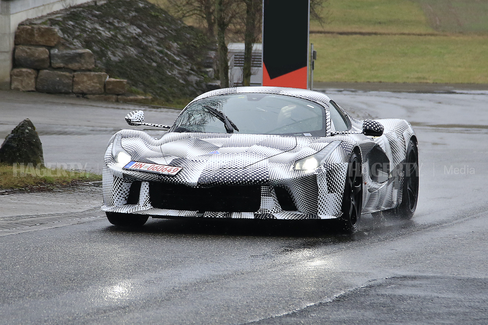New Ferrari Hypercar Mule spy front three-quarter