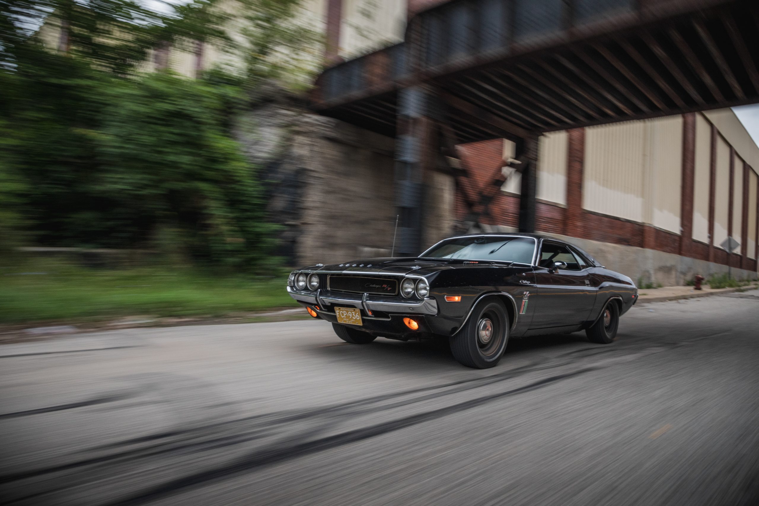 black ghost challenger front three-quarter action