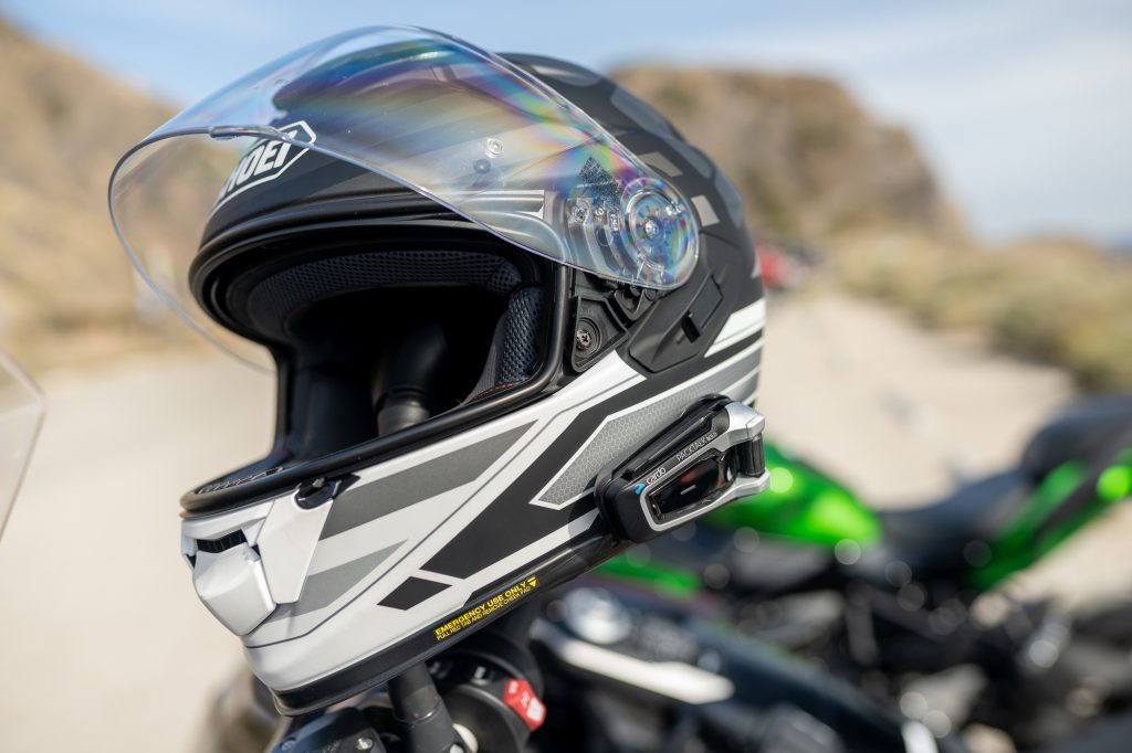 shoei moto helmet with kawasaki background