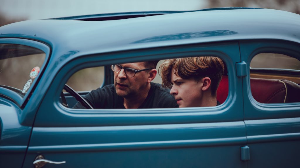 1933 Ford Coupe father son driving portrait