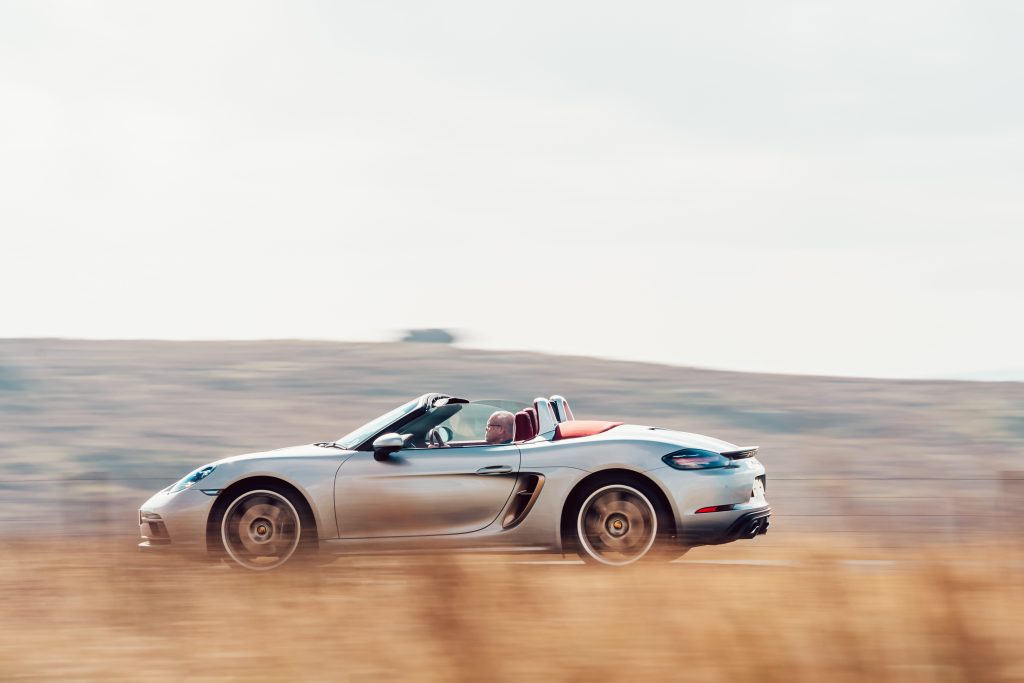 2021 Porsche Boxster 25 Years side profile driving action