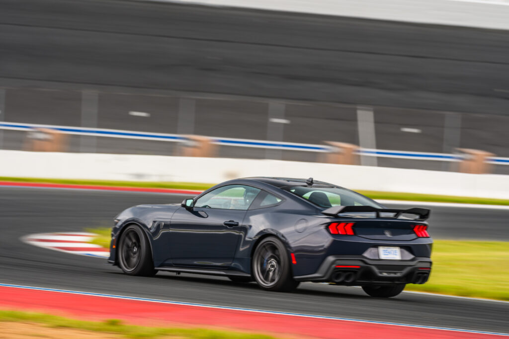 Ford Mustang Dark Horse track action rear three quarter