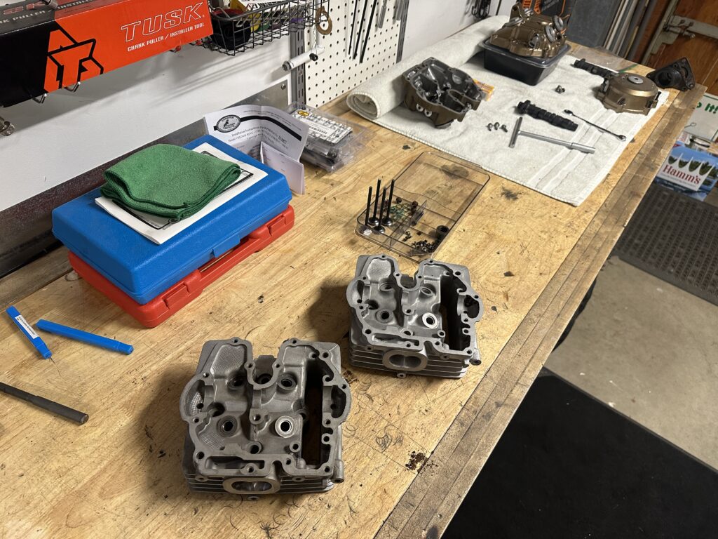 xr250r cylinder heads on workbench