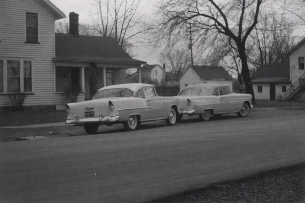 Wilcox 1955 Chevrolet historical street parked three quarter black white