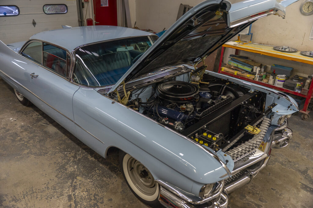 Cadillac parts restoration high angle engine bay work