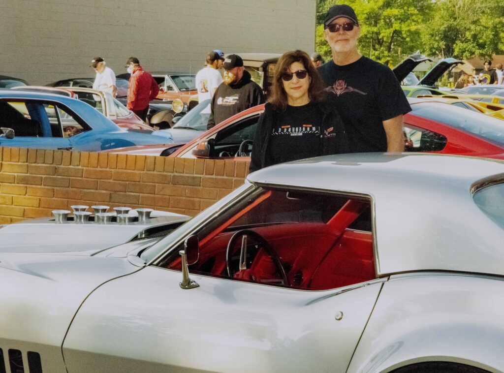 Carolyn and Tom Peters at a cars and coffee get together in 2021