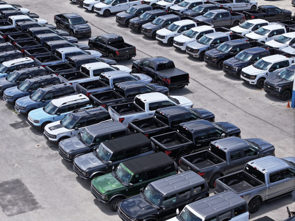 Ford vehicles lined up sales lot metro Ford dealership