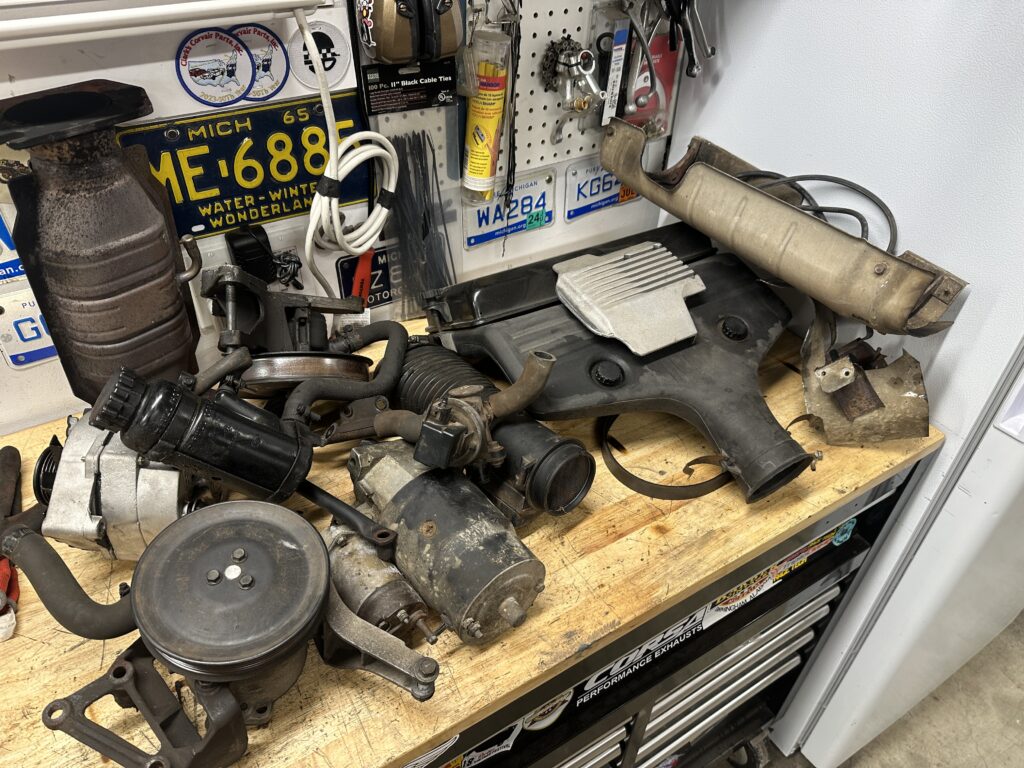 Corvette parts on workbench