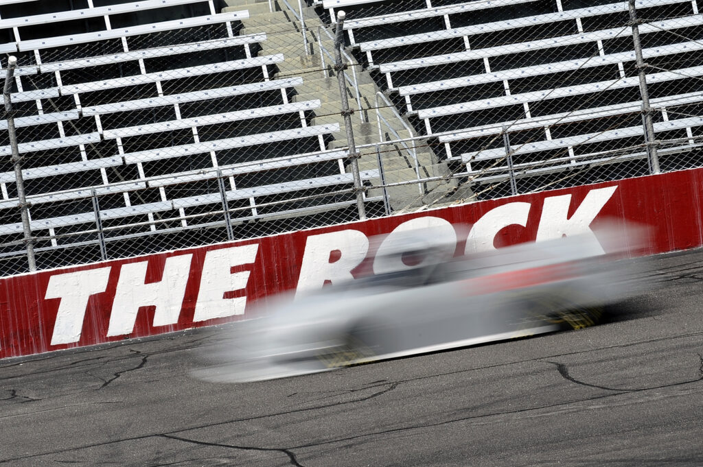 Timothy Peters, driver for Red Horse Racing, drives down the frontstretch during the NASCAR tire test at Rockingham Speedway
